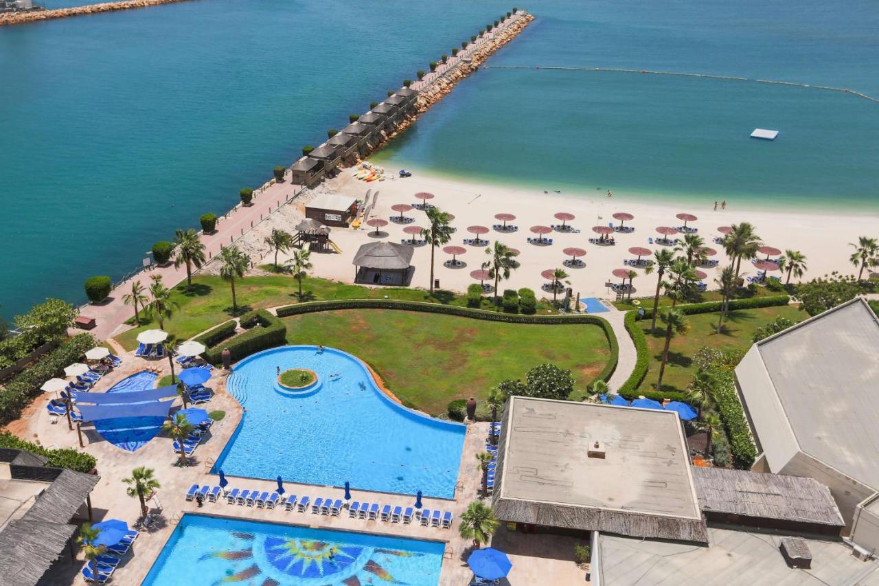 Radisson Blu Resort, Charjah Extérieur photo The beach at Jumeirah Beach Hotel